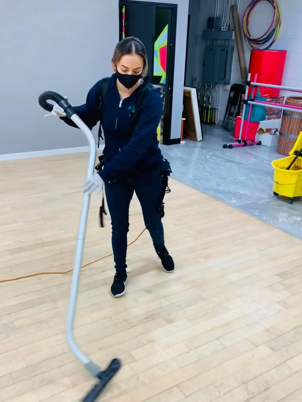 Professional janitorial specialist at work in a Northwest Suburbs facility